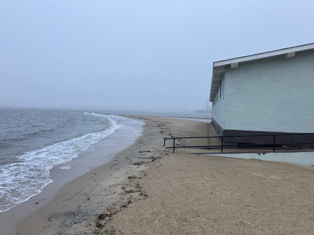 a building on a beach (MyCoast AI)