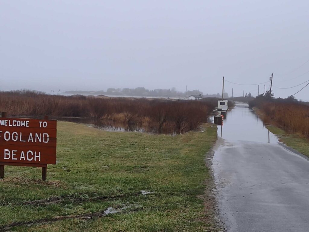 a road with a sign on it (MyCoast AI)