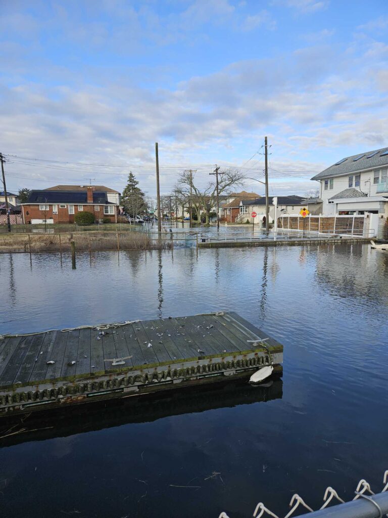 a body of water with buildings along it (MyCoast AI)