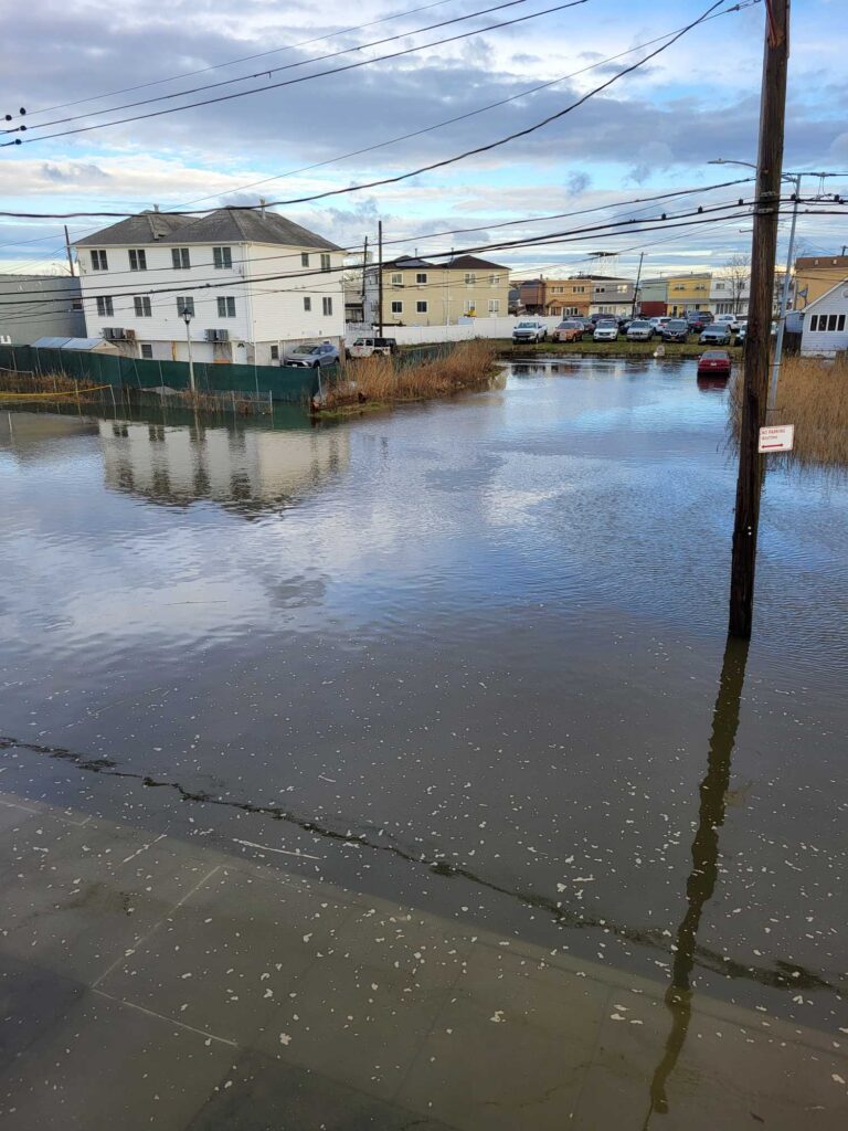 a body of water with buildings along it (MyCoast AI)