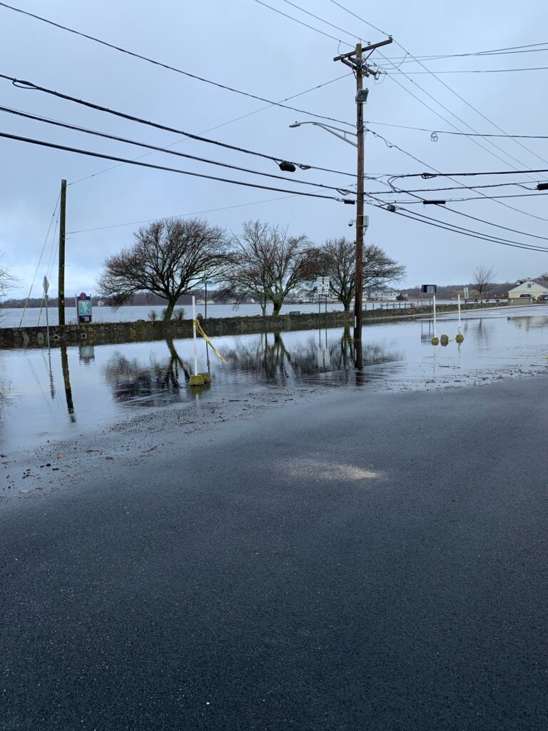 a flooded street with power lines (MyCoast AI)