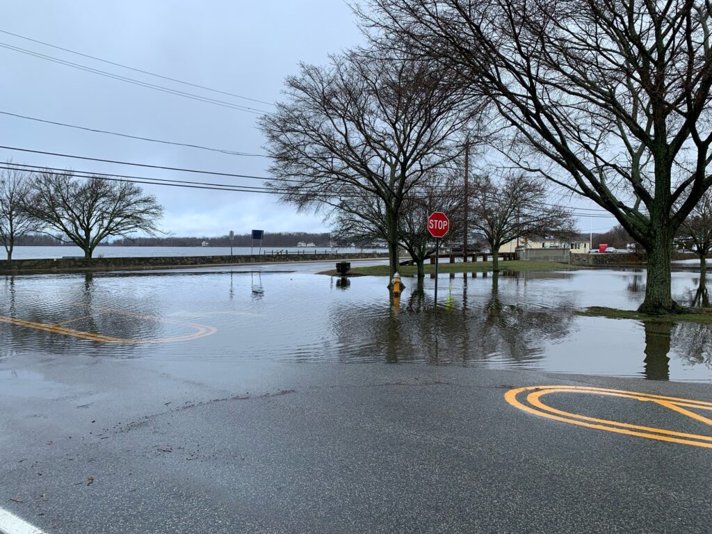 a flooded street with a stop sign (MyCoast AI)