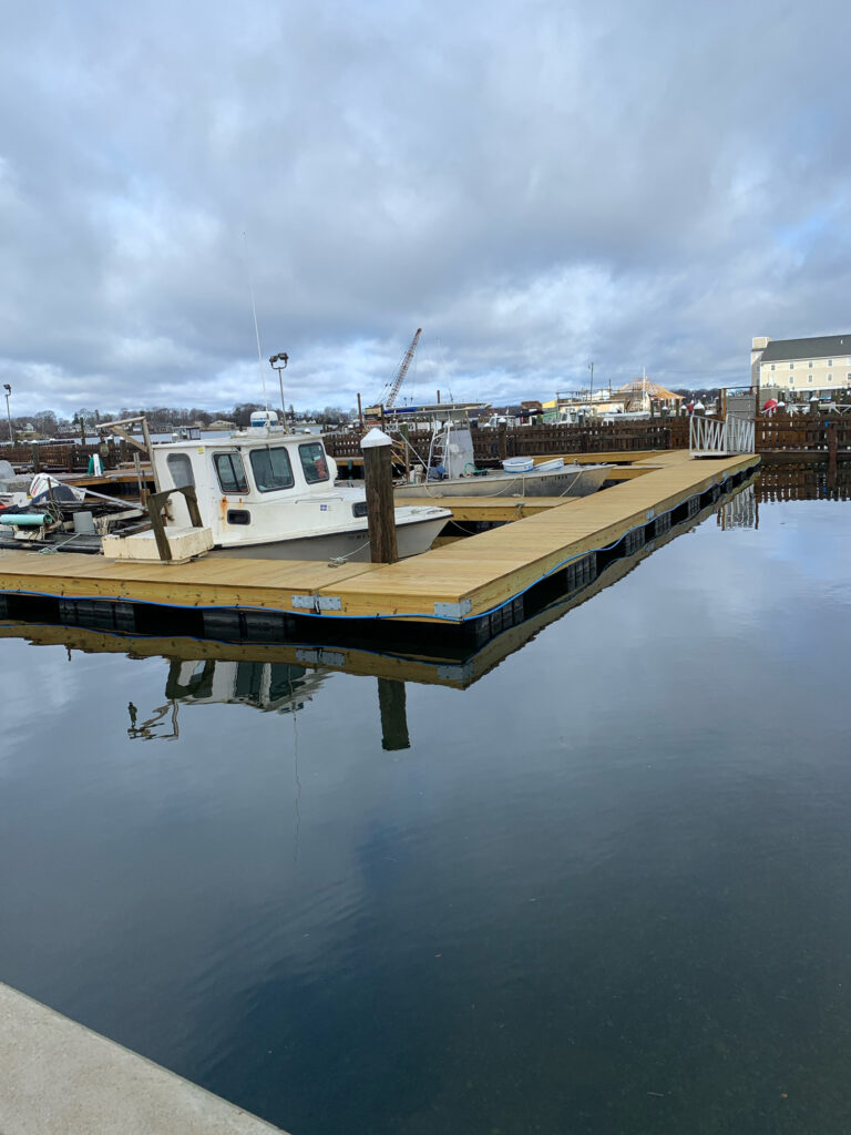 a boat docked at a pier (MyCoast AI)