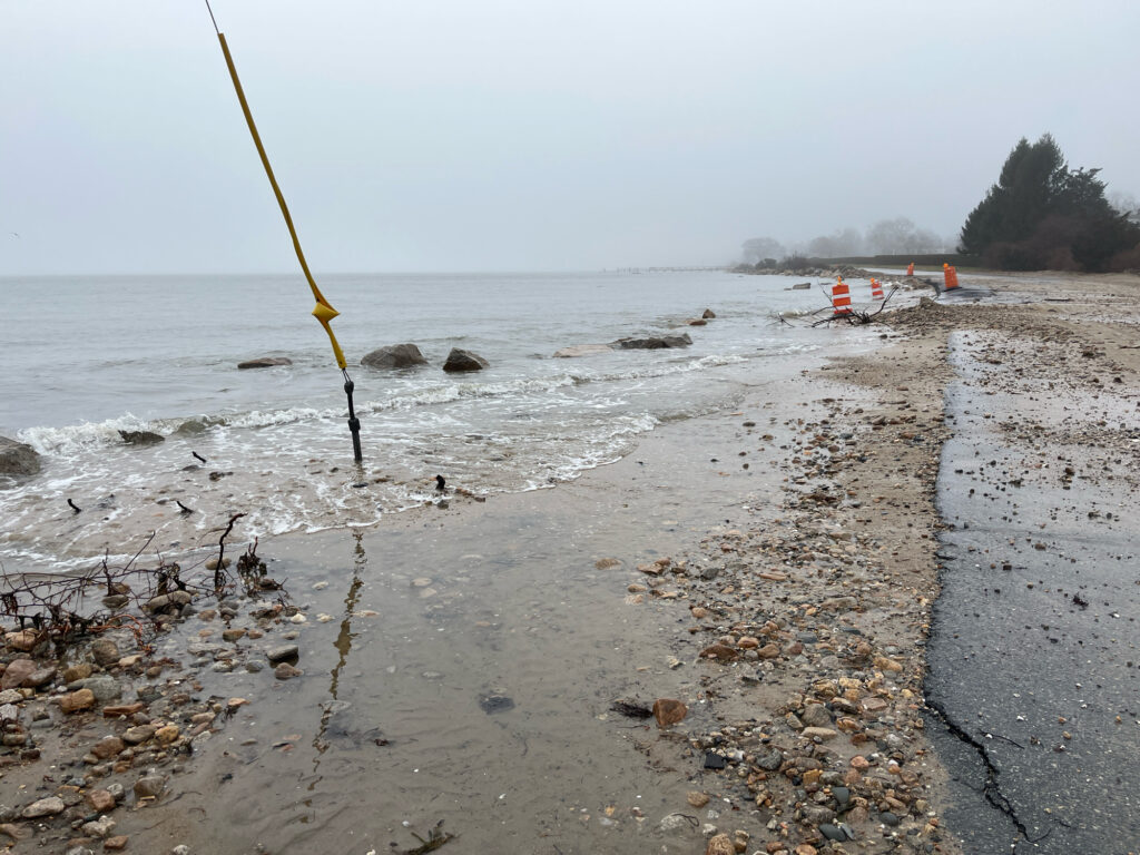 a beach with a yellow pole (MyCoast AI)
