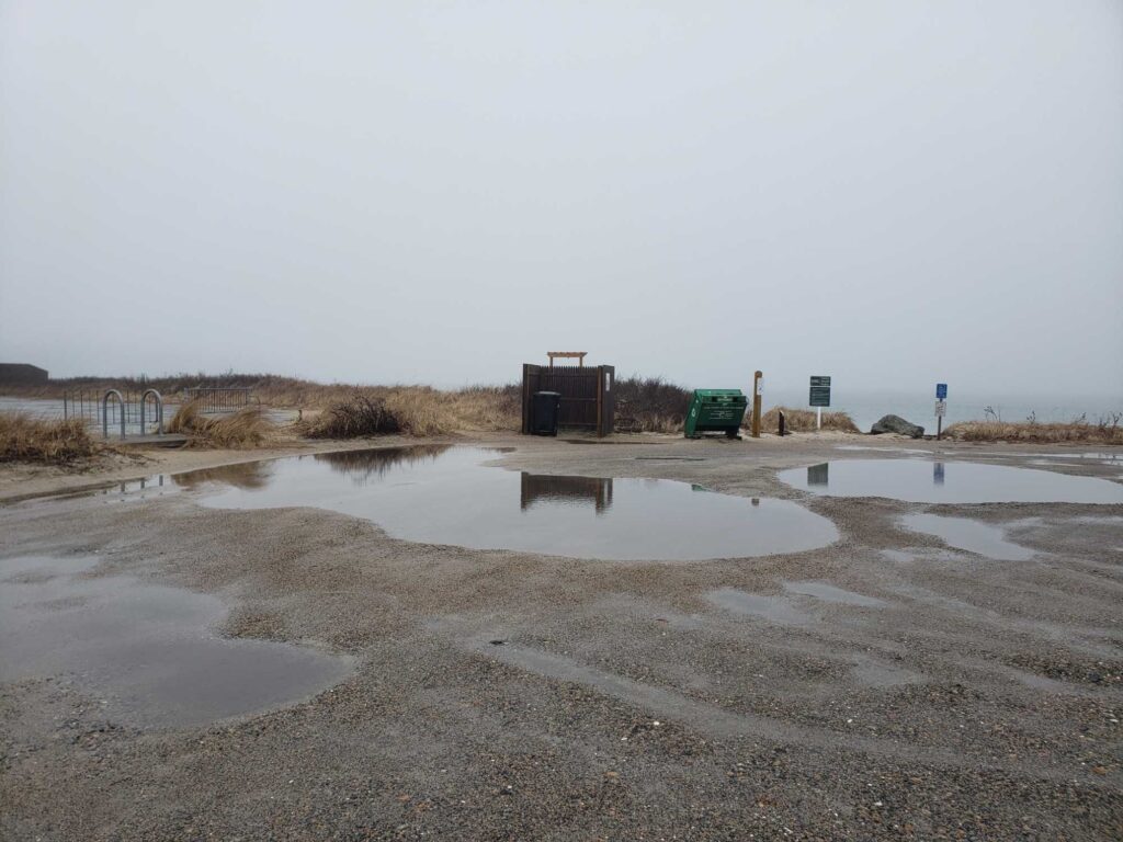 a large puddle of water in a field (MyCoast AI)