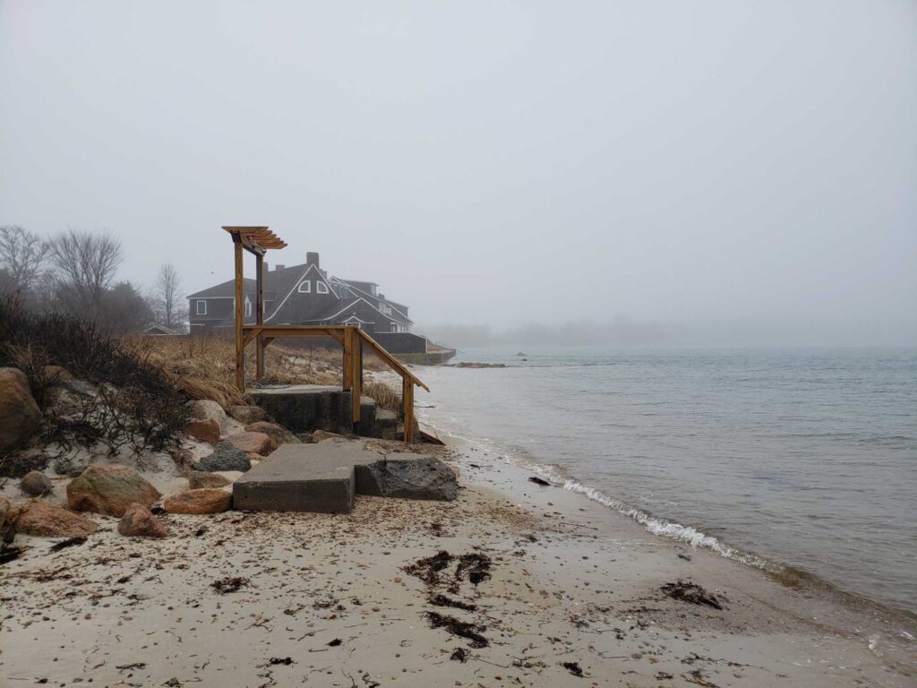 a wooden bridge over a body of water (MyCoast AI)