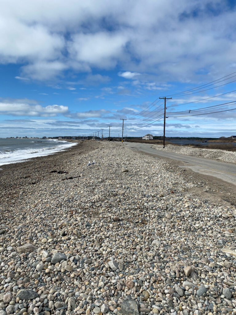 a rocky beach with power lines (MyCoast AI)