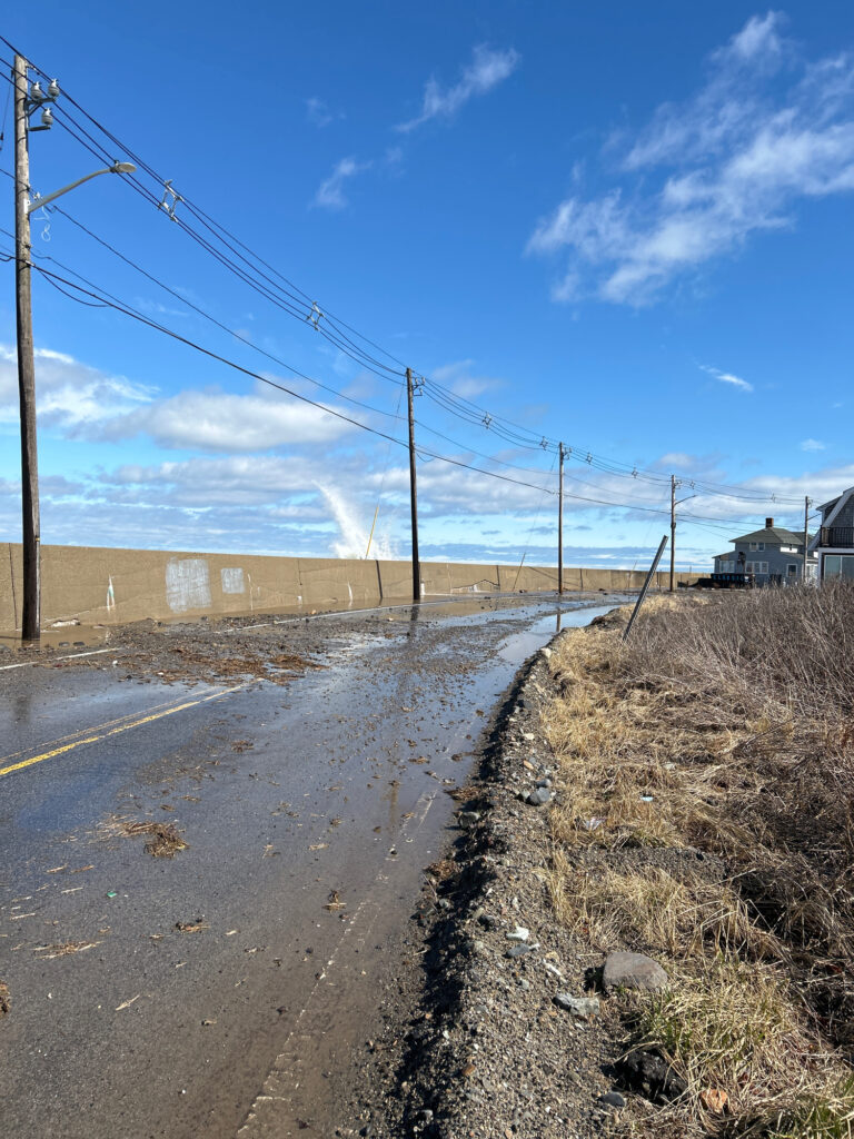 a road with power lines on the side (MyCoast AI)