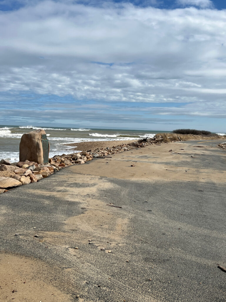 a rocky beach with waves crashing (MyCoast AI)