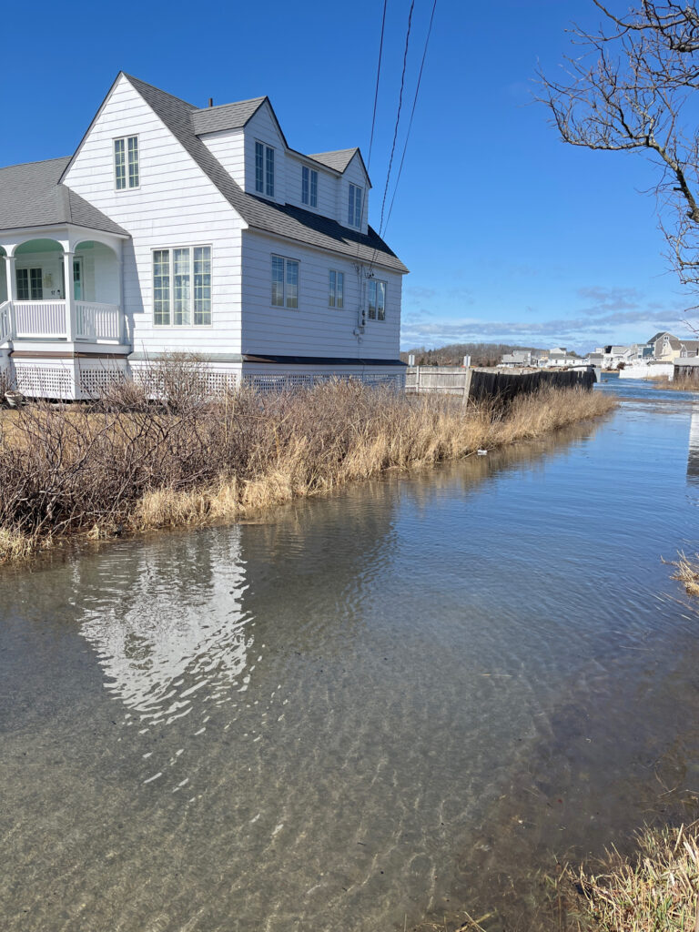 a house next to a river (MyCoast AI)