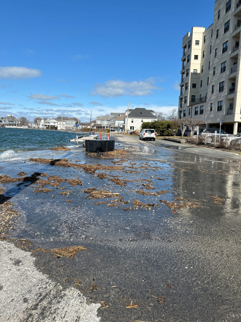 a beach with buildings and cars (MyCoast AI)