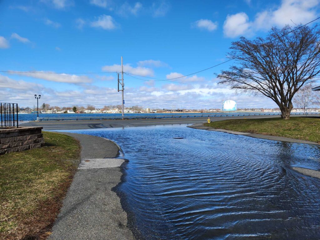 a body of water with a path and grass on the side (MyCoast AI)