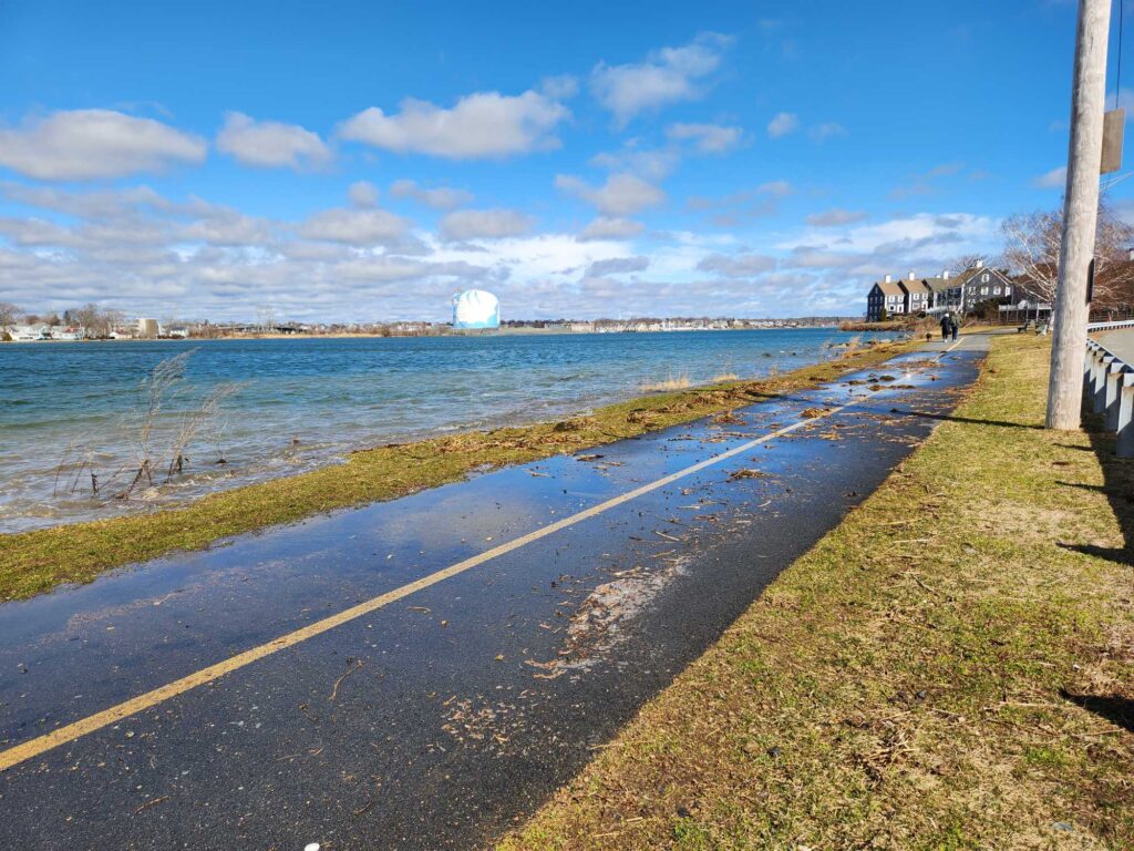 a road next to a body of water (MyCoast AI)