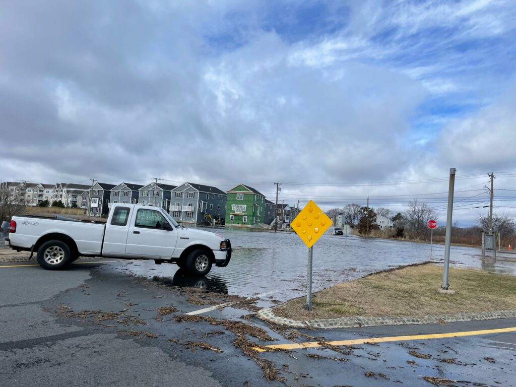 a white truck parked on the side of a road (MyCoast AI)