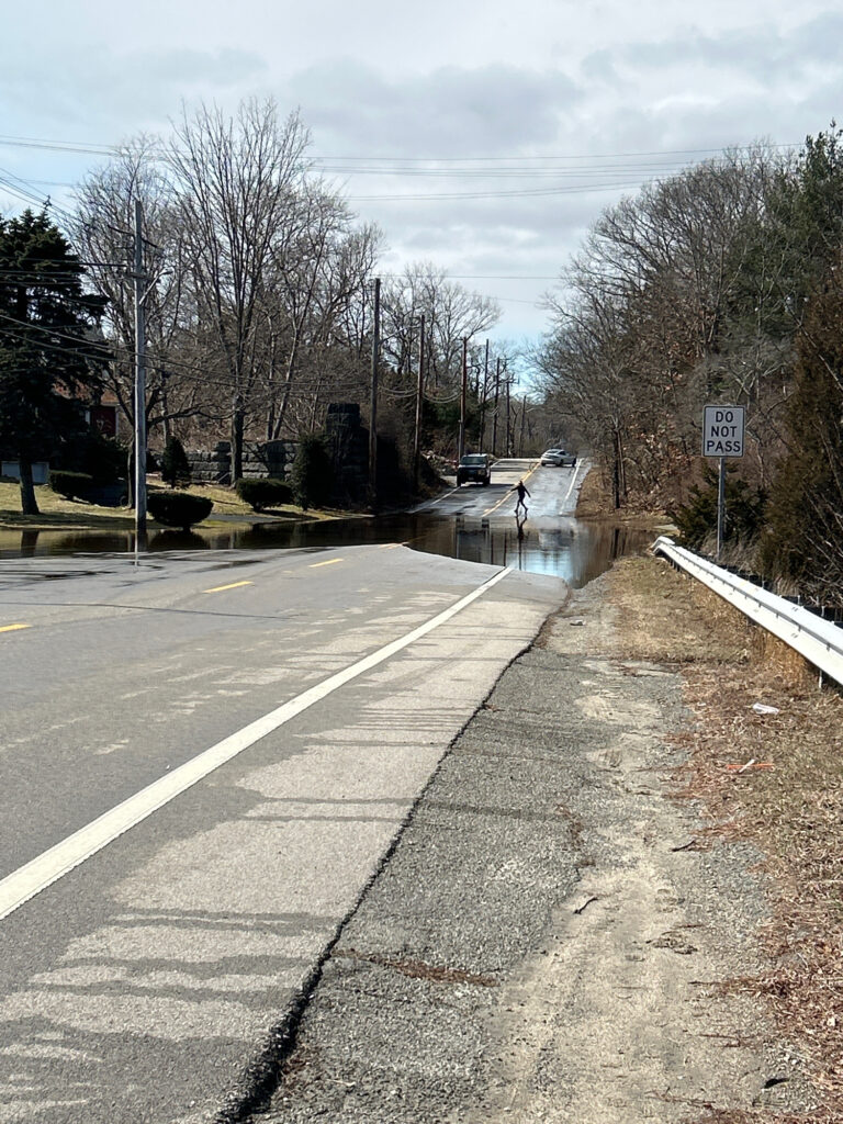 a road with water on the side (MyCoast AI)