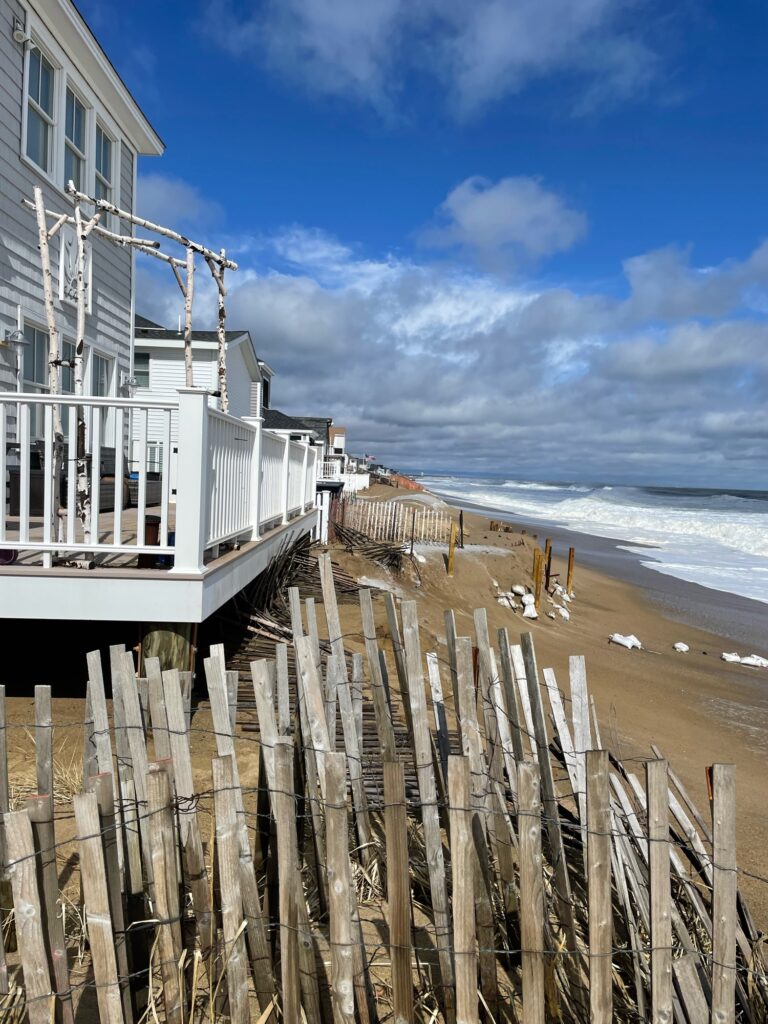 a building next to a beach (MyCoast AI)