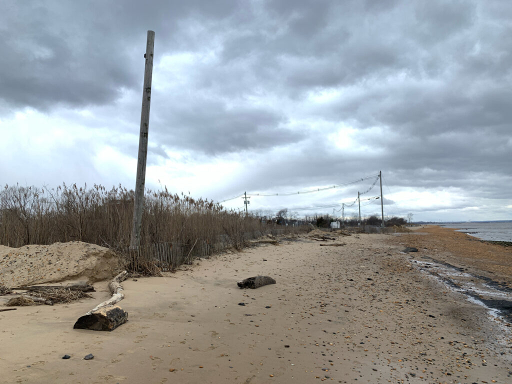 a sandy beach with power lines (MyCoast AI)