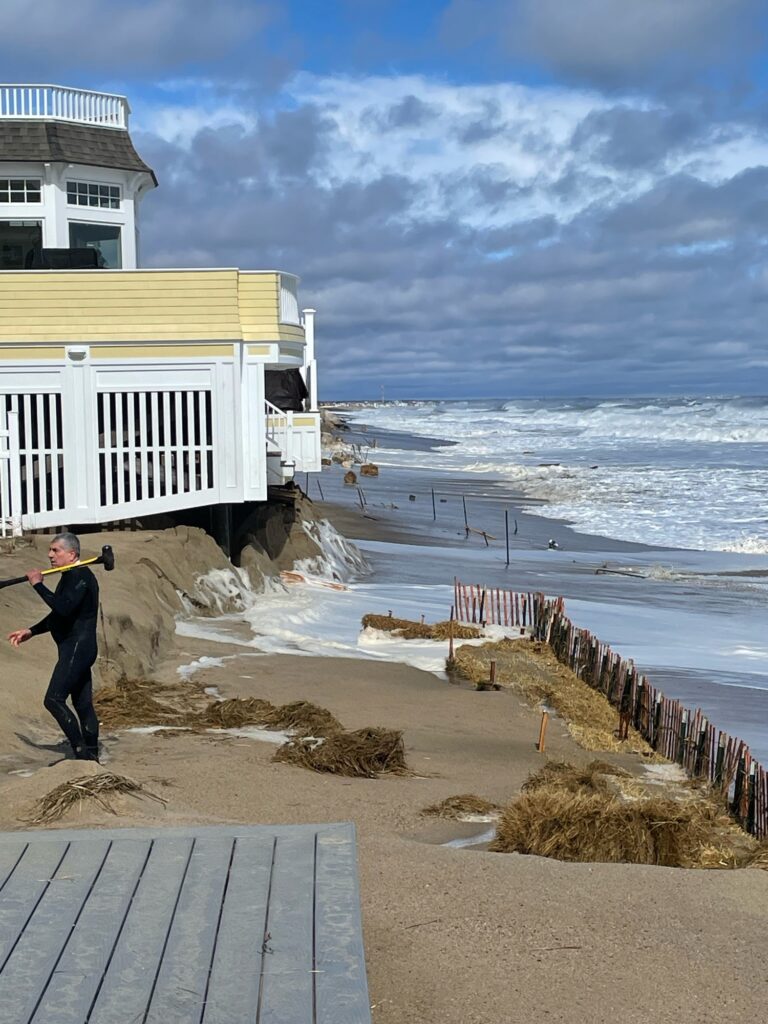 a person standing on a beach (MyCoast AI)