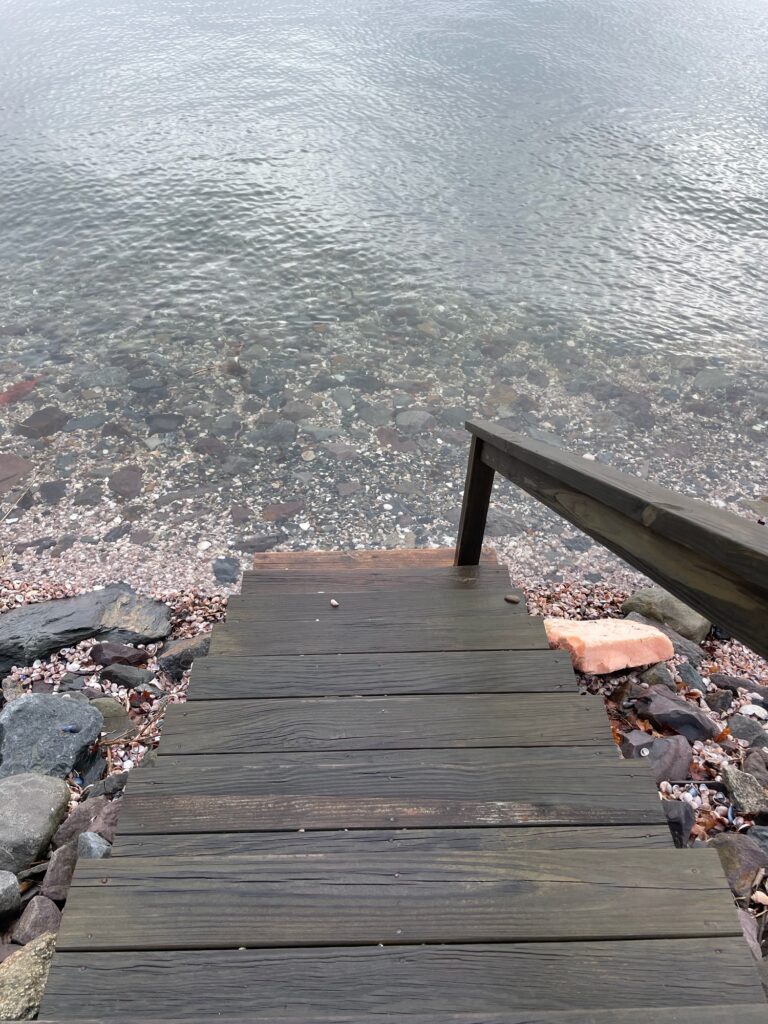 a wooden dock over water (MyCoast AI)