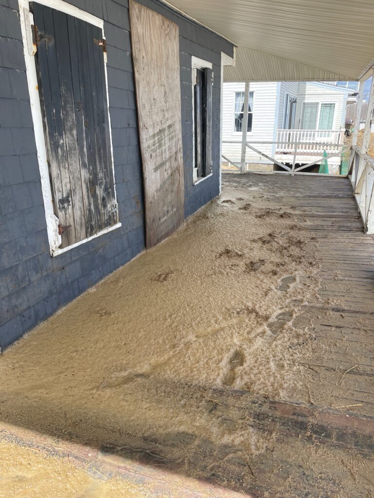 a dirt area next to a building (MyCoast AI)