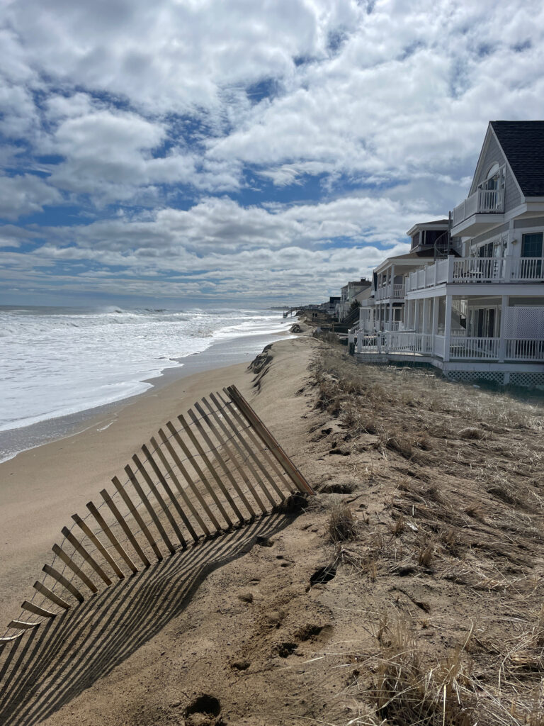 a beach with a building along it (MyCoast AI)