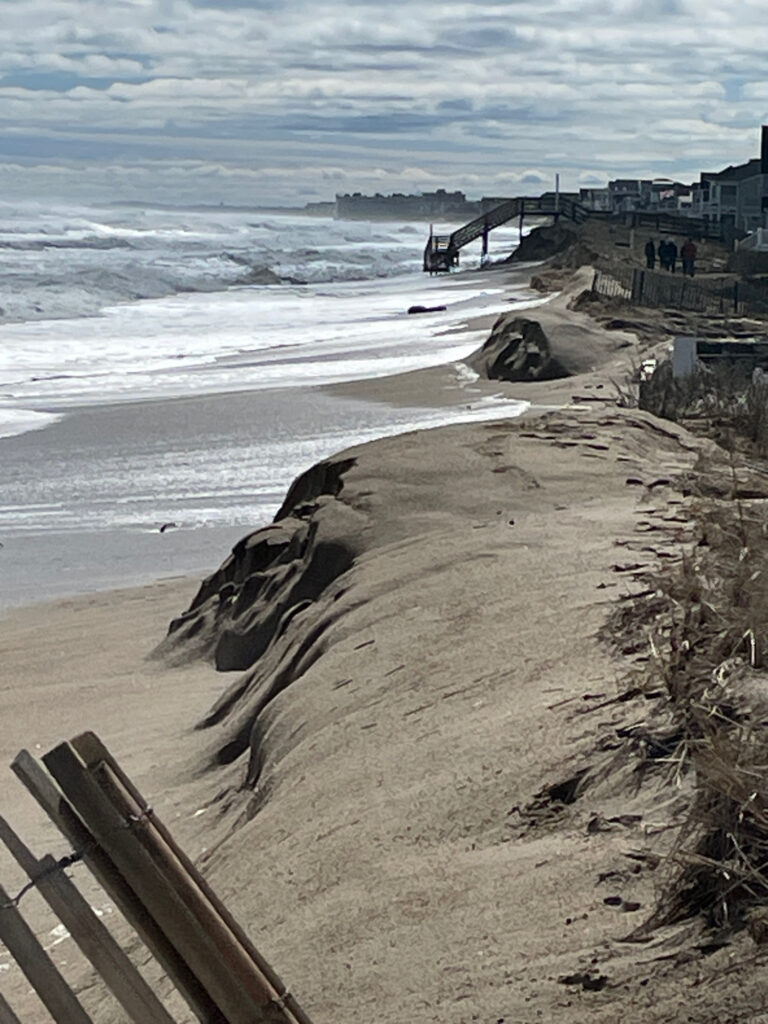 a beach with waves crashing on it (MyCoast AI)