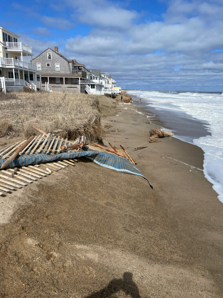 a beach with a row of houses (MyCoast AI)