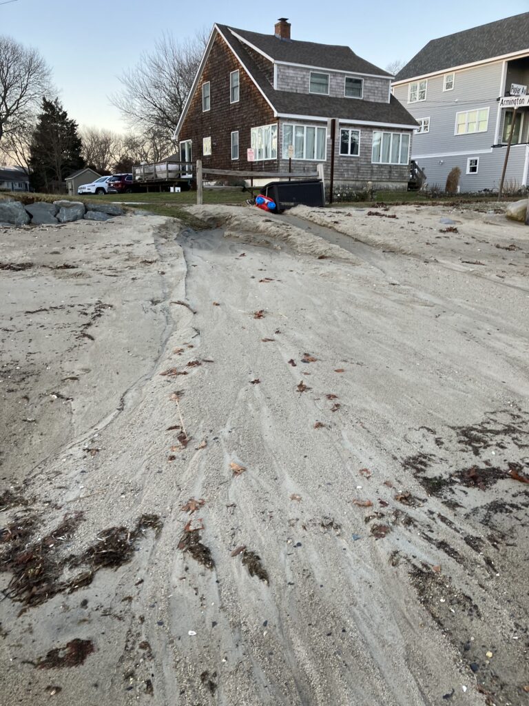 a dirt road with houses on the side (MyCoast AI)