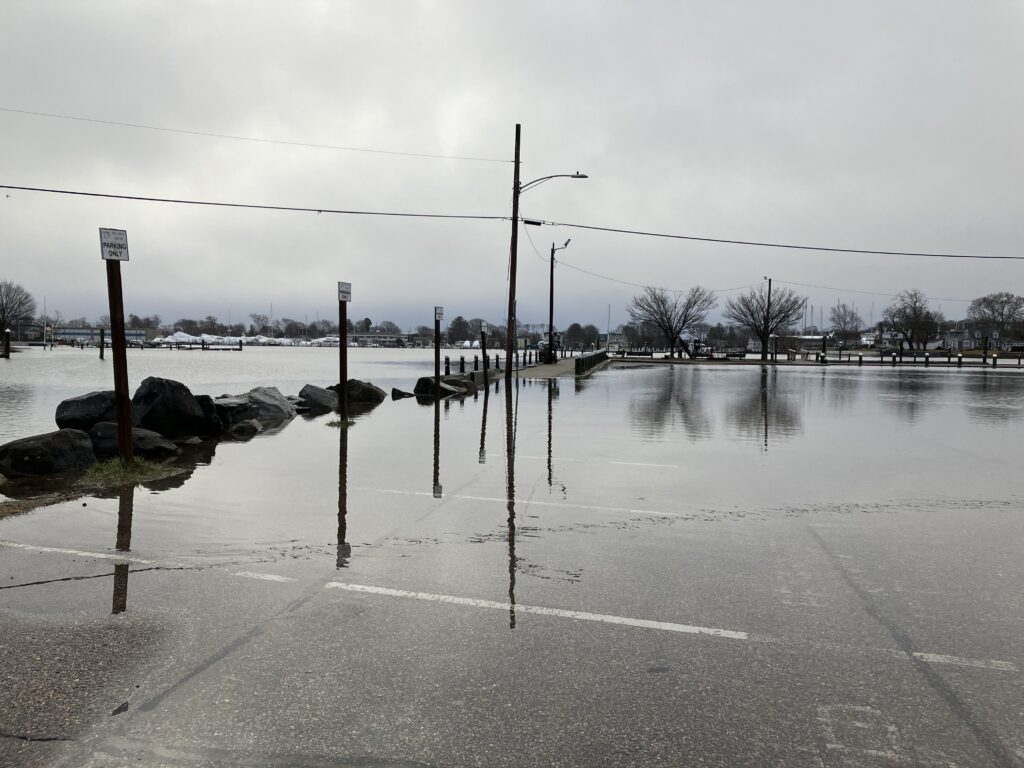 a flooded area with a few poles (MyCoast AI)