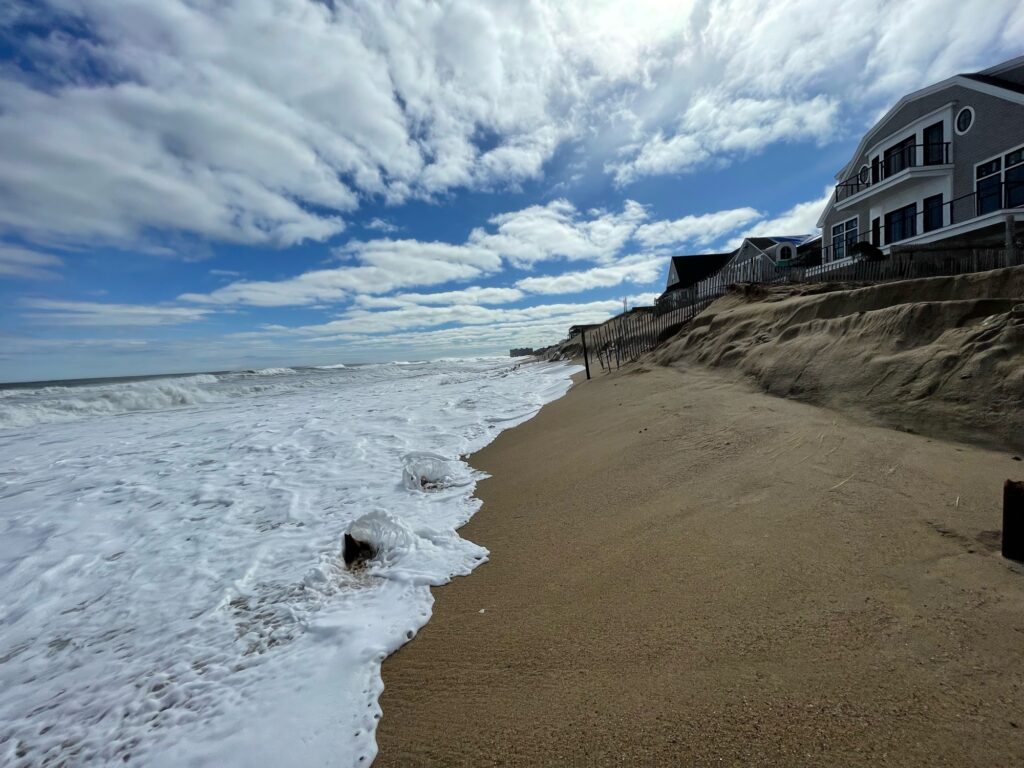 a beach with waves crashing on it (MyCoast AI)