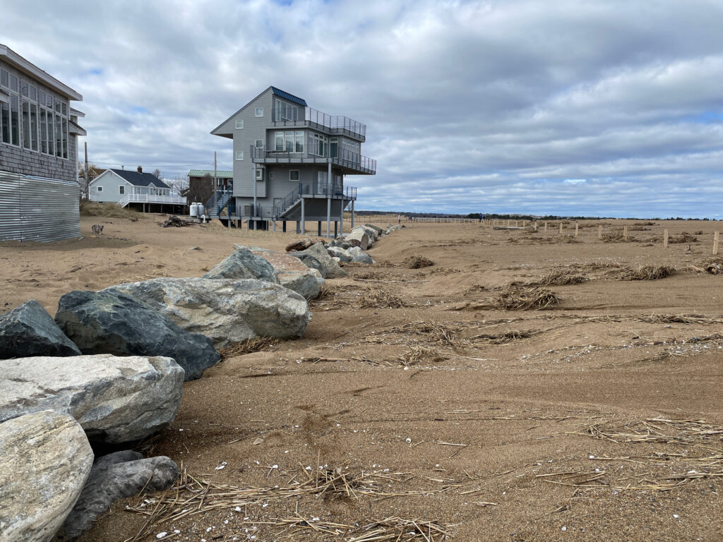 a building on a rocky beach (MyCoast AI)