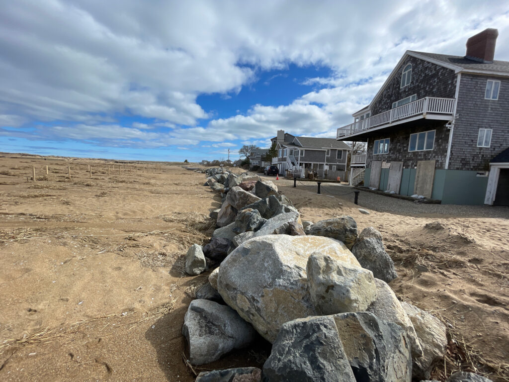 a rocky area with buildings in the background (MyCoast AI)