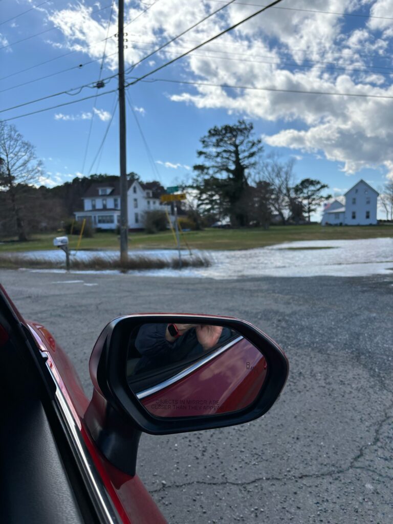 a car driving on a road (MyCoast AI)