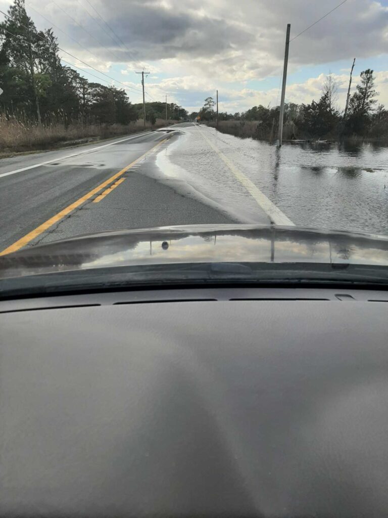 a road with water on the side (MyCoast AI)