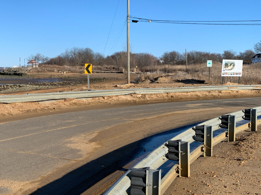 a road with a sign on it (MyCoast AI)