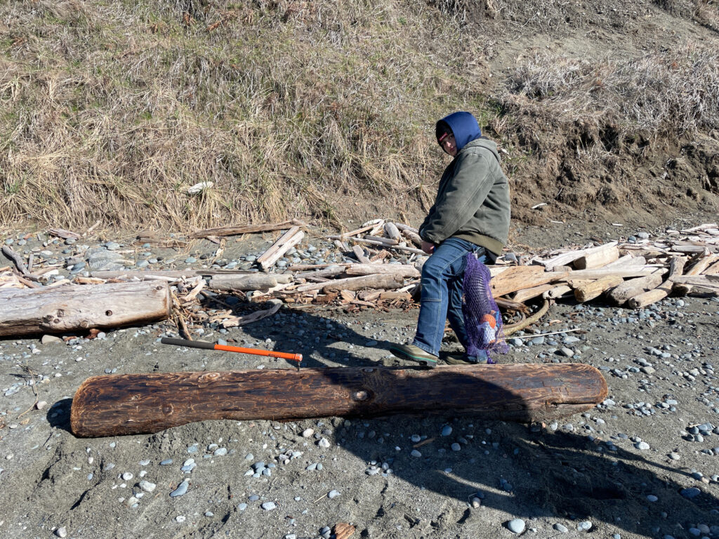 a man standing on a log (MyCoast AI)