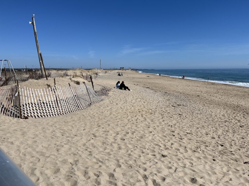 a person sitting on a beach (MyCoast AI)