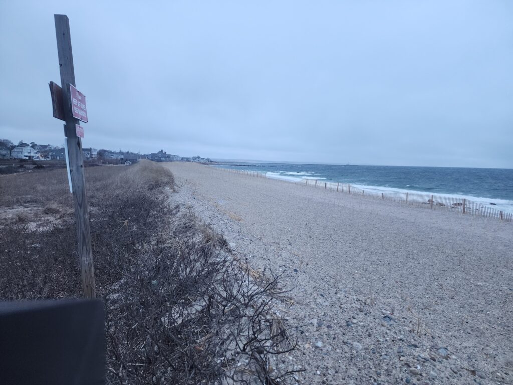 a beach with a sign (MyCoast AI)
