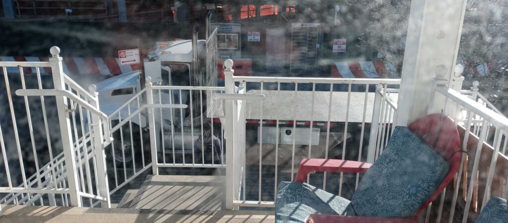 a person sitting on a deck (MyCoast AI)