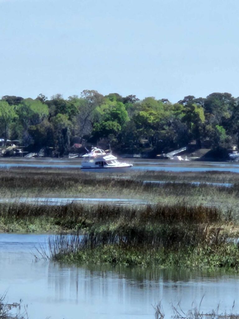 a helicopter flying over a lake (MyCoast AI)