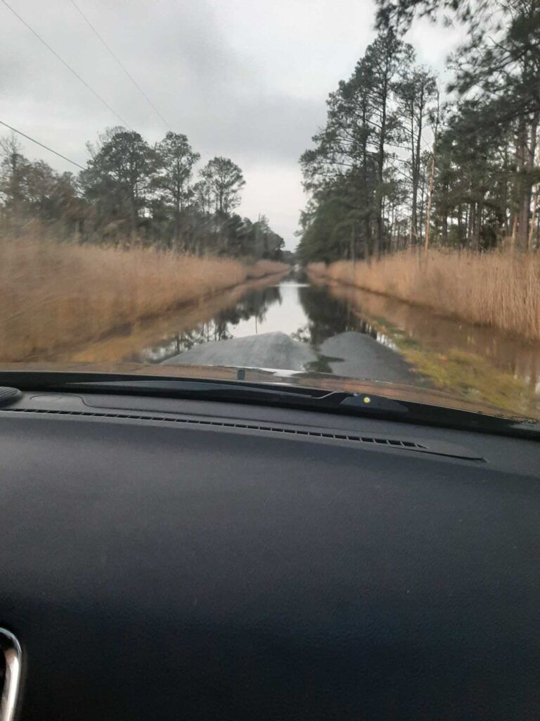a car driving on a road (MyCoast AI)