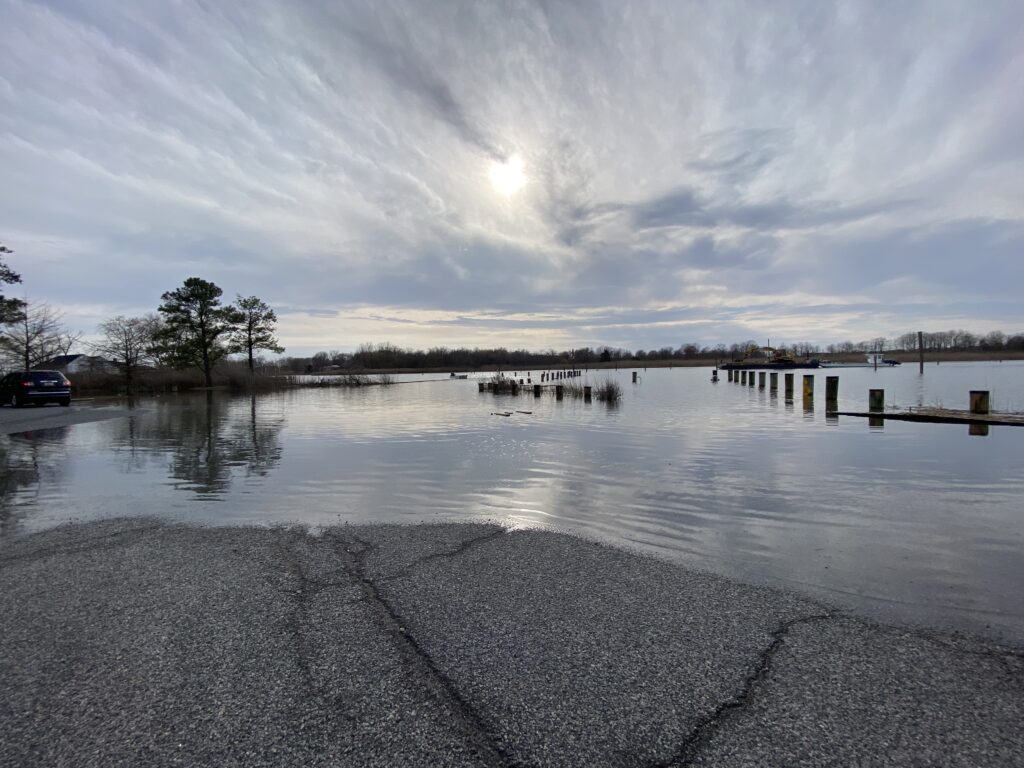 a body of water with a car parked on the side (MyCoast AI)