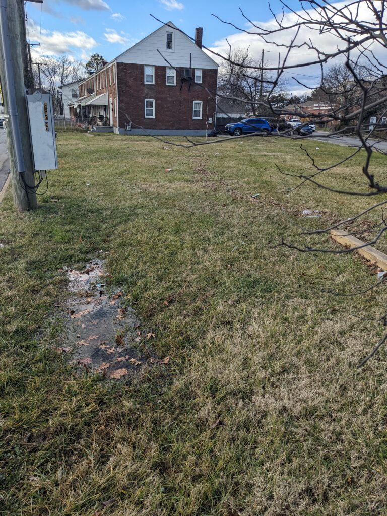 a brick building with a dirt path (MyCoast AI)