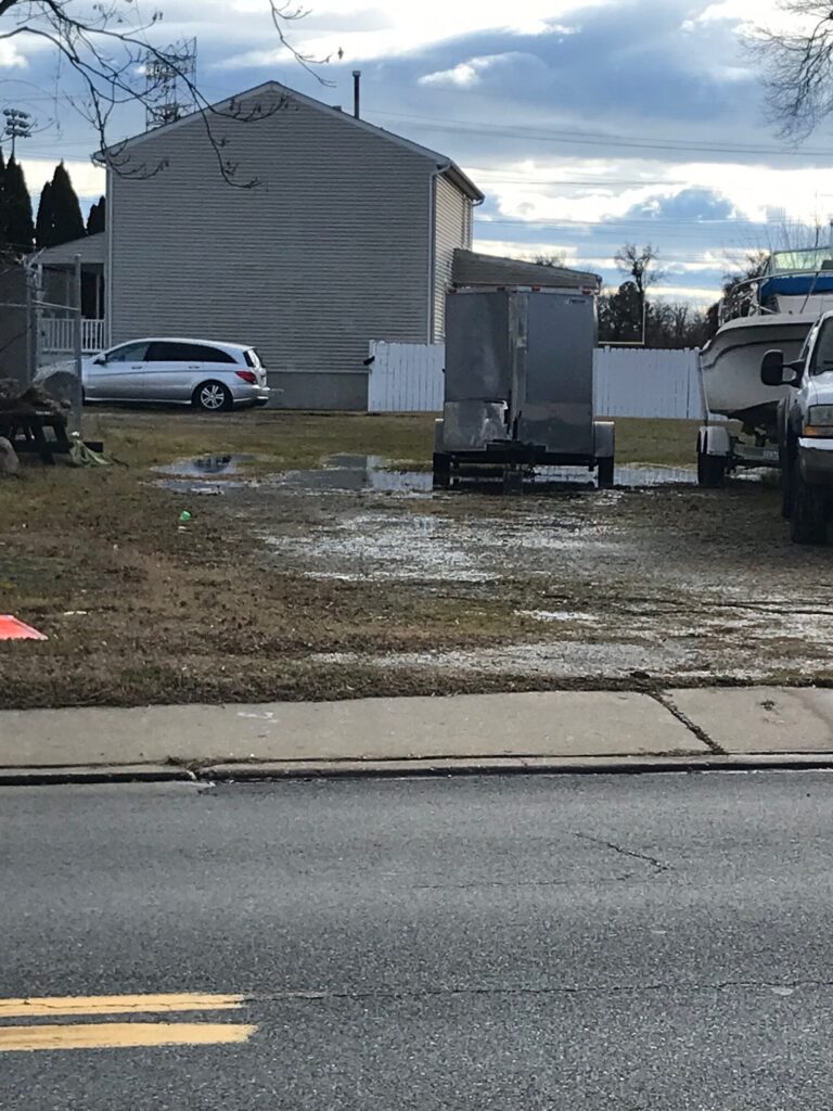 a building with a trailer in front (MyCoast AI)