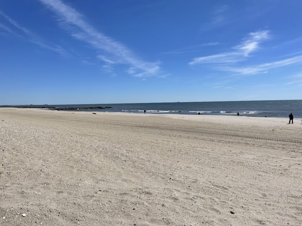 a person walking on a beach (MyCoast AI)