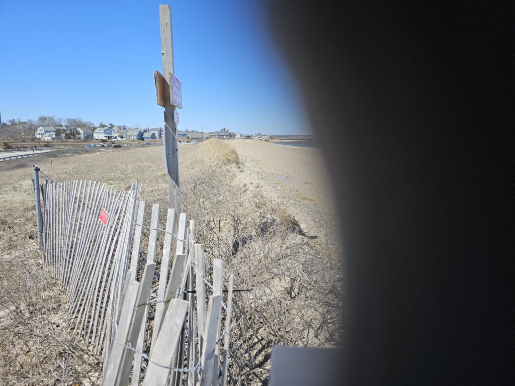 a fence with a sign on it (MyCoast AI)