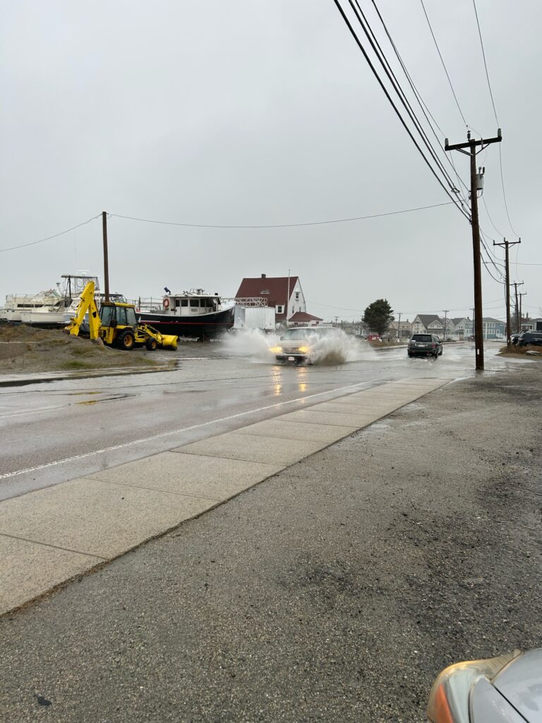 a road with water on the side (MyCoast AI)