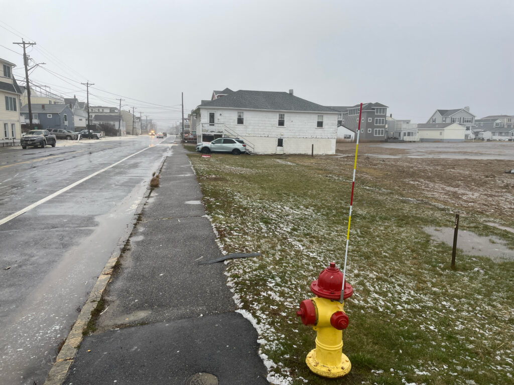 a red and yellow fire hydrant (MyCoast AI)