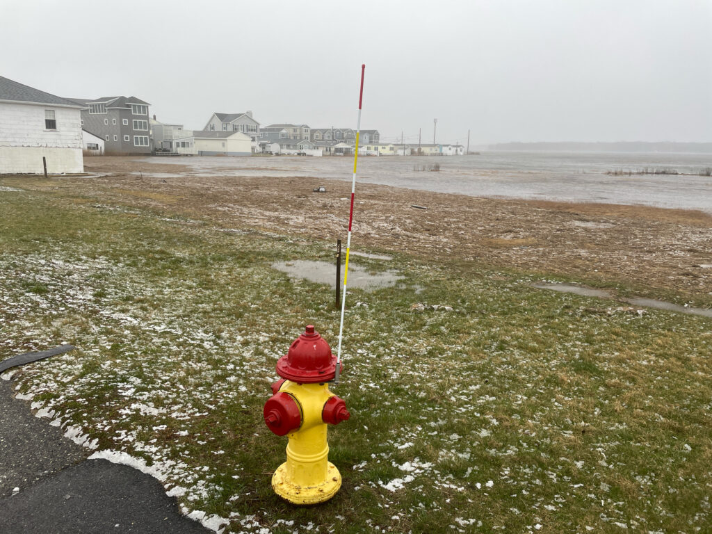 a red and yellow fire hydrant (MyCoast AI)