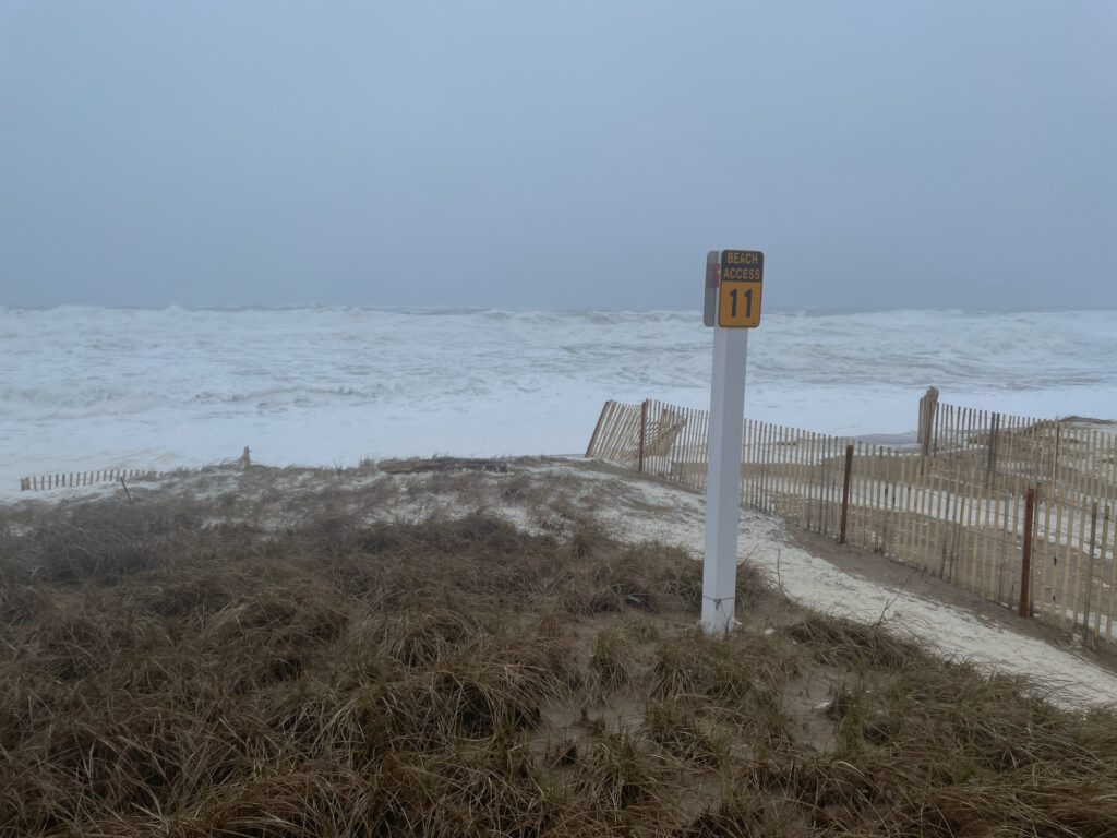 a beach with a sign (MyCoast AI)